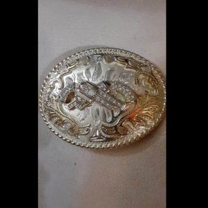 Silver and gold pistol buckle